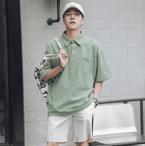 Casual outfit wearing an off white short, cap and green oversized shirt