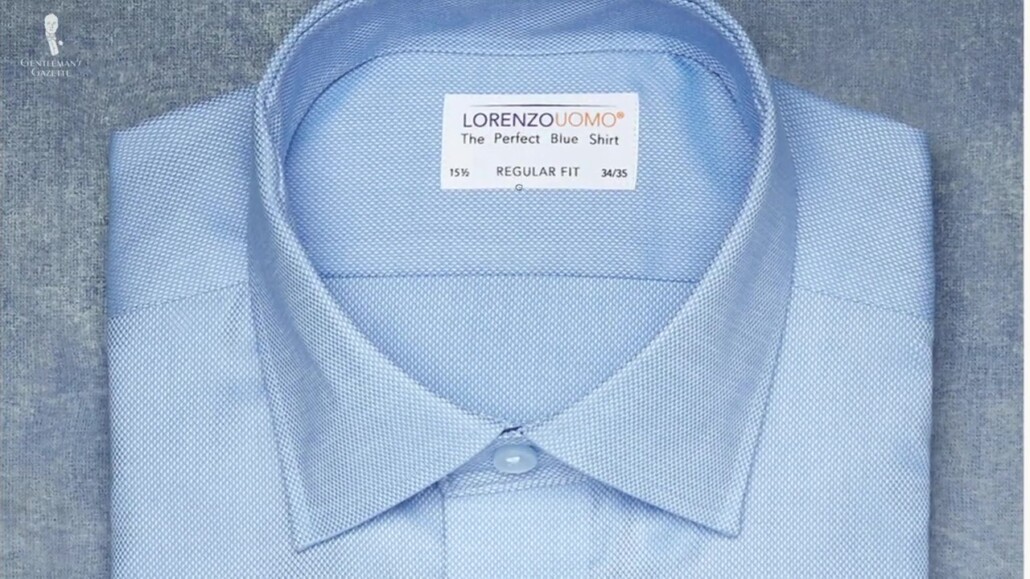 A tag that says "The Perfect Blue Shirt."