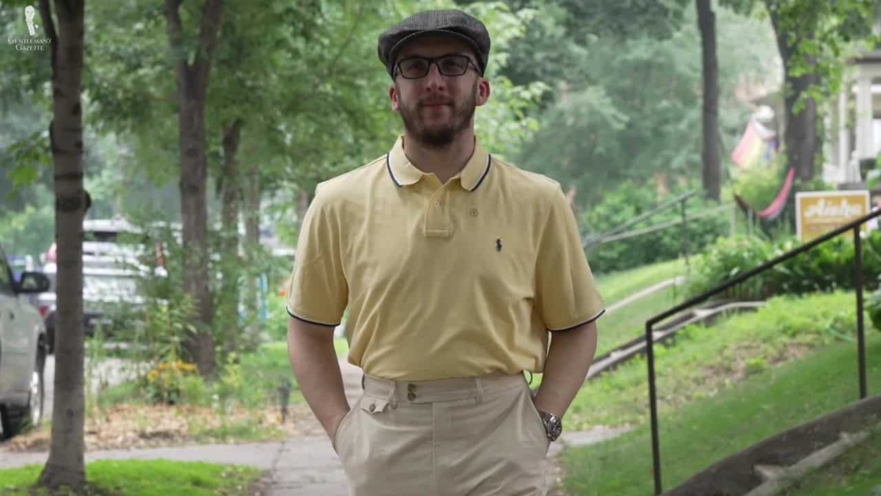 Chris in yellow polo shirt and flat cap Chris in a yellow polo shirt and flat cap.