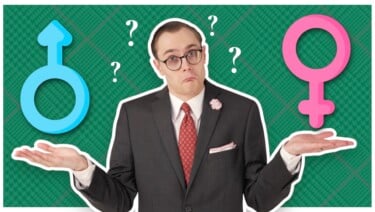 Preston looks confused standing between male and female symbols
