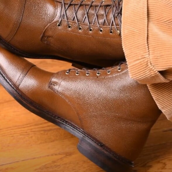 conventional menswear shoe styles a brown grain leather men’s dress boot with a low stacked heel