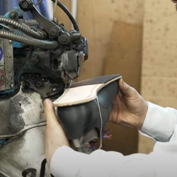 Video highlight 4: "This machine is one of the reasons why some of our shoes have to be protected with a little coat of plastic."