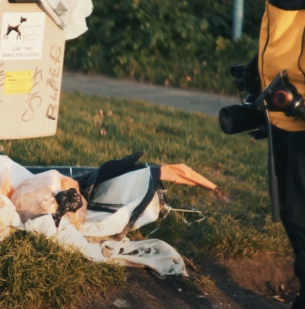 litter beside trash bin