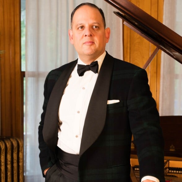 Raphael in a tartan black tie dinner jacket