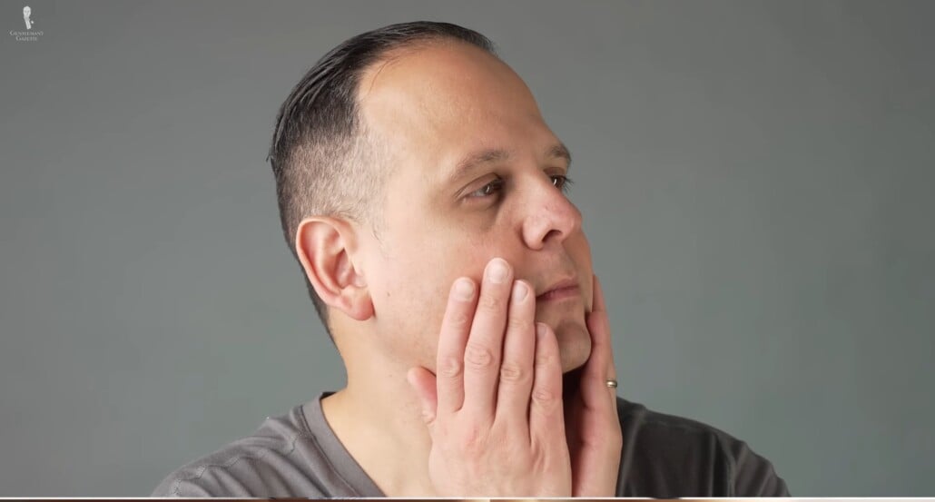 Raphael moisturizing his face