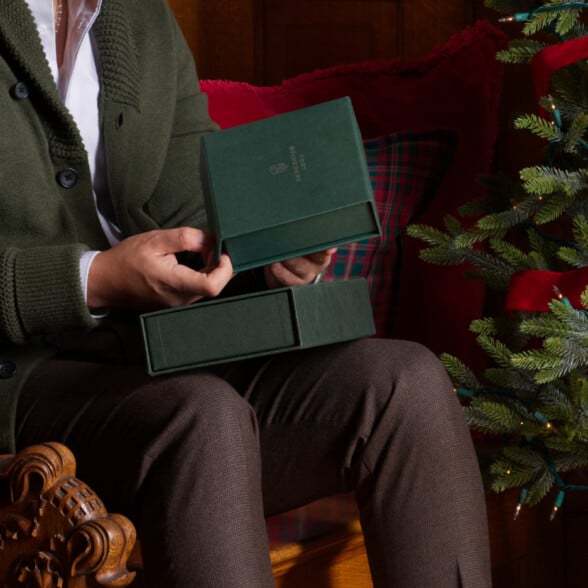 Fort Belvedere Christmas 1030 By 936 A man handles a Fort Belvedere gift box