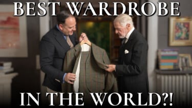 Two men admire a jacket. Text reads, "Best Wardrobe in the World!?"