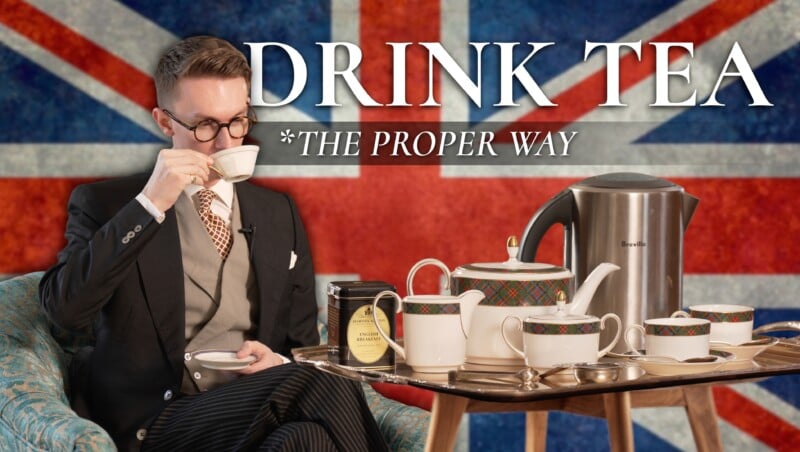 How To Drink Tea Updated Banner3 3840By2160 Man in a classic suit drinking tea from a teacup beside a traditional tea set with kettle and teapot against a British flag background. Text reads: “DRINK TEA – THE PROPER WAY.”