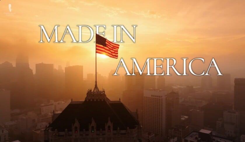 American flag flying over a city skyline at sunset. Text reads: &ldquo;MADE IN AMERICA.&rdquo;
