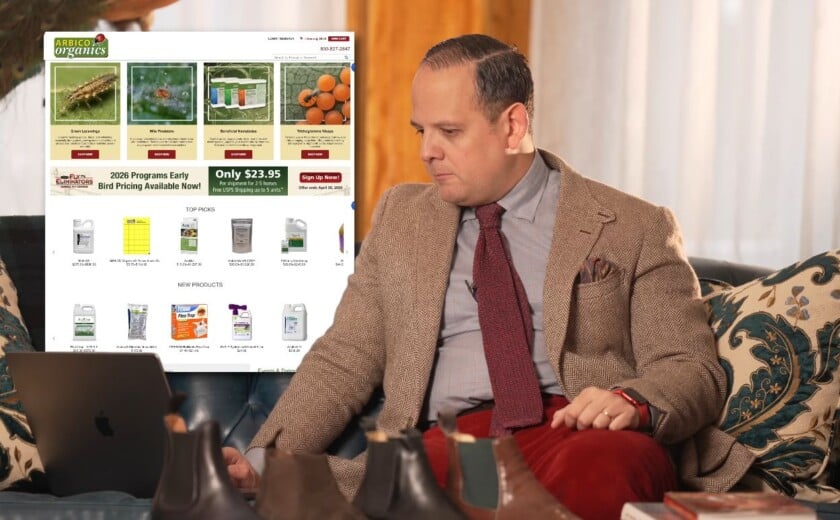 Raphael reviewing the Arbico Organics website on a laptop