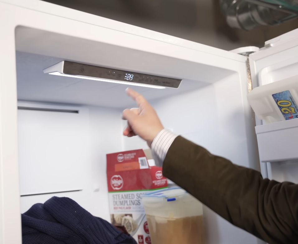 A hand pointing to a freezer&rsquo;s digital control panel set to a lethal zero degrees Fahrenheit