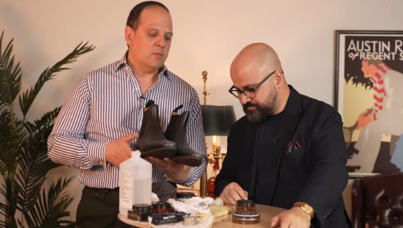Raphael and Preston Soto clean shoes
