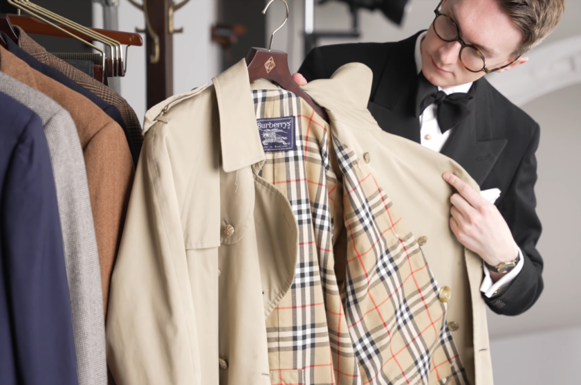 Burberry Trench Coat Check Lining Tan Poplin Jack Collins holding open a tan Burberry trench coat to show the beige, black, and red check lining and the Burberrys Made in England label