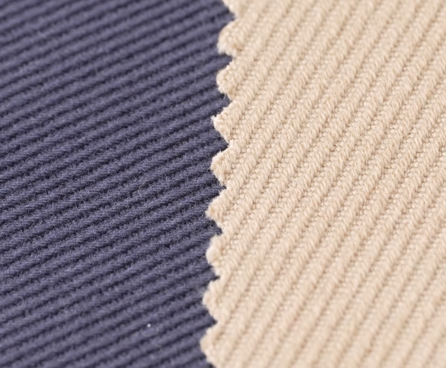 Drill Twill Navy Cream Swatch Navy and cream cotton drill swatches showing the steep diagonal twill lines and firm, tight weave